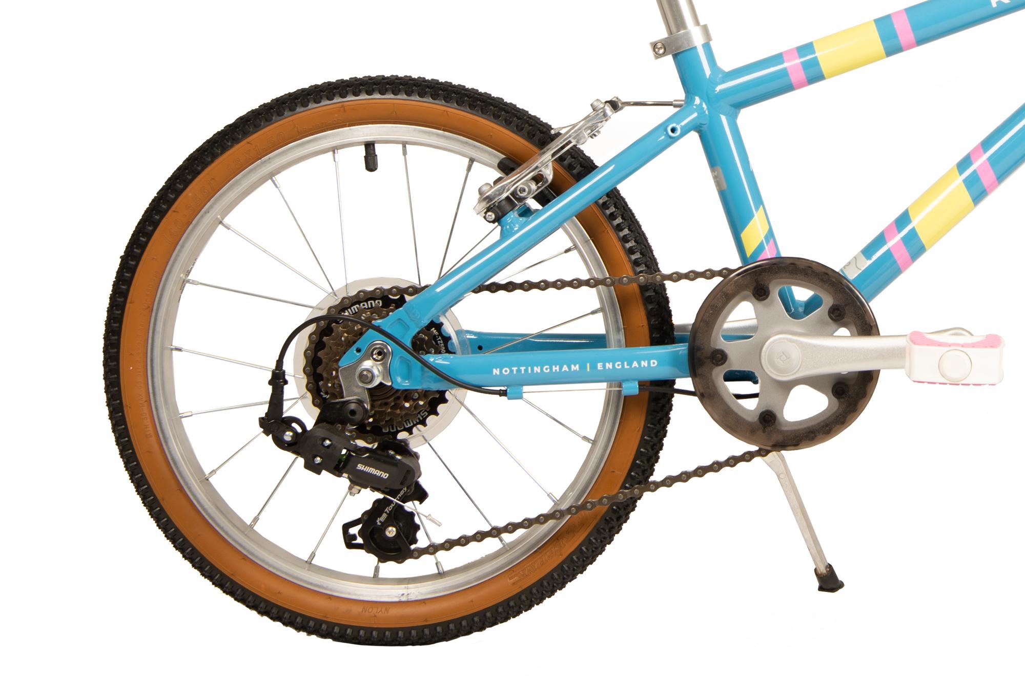 Rear wheel and drivetrain on the Raleigh Pop 18 inch kids bike in light blue colour
