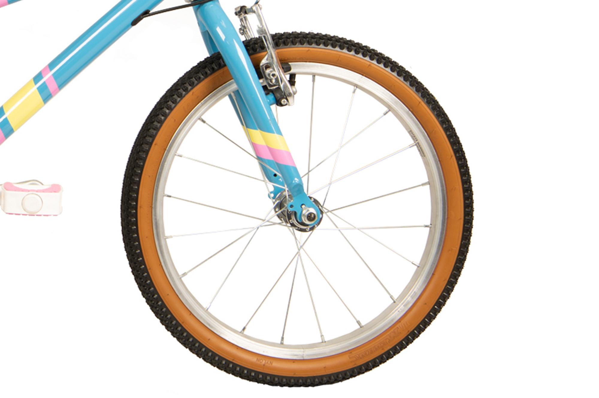 Front wheel on the Raleigh Pop 18 inch kids bike in light blue